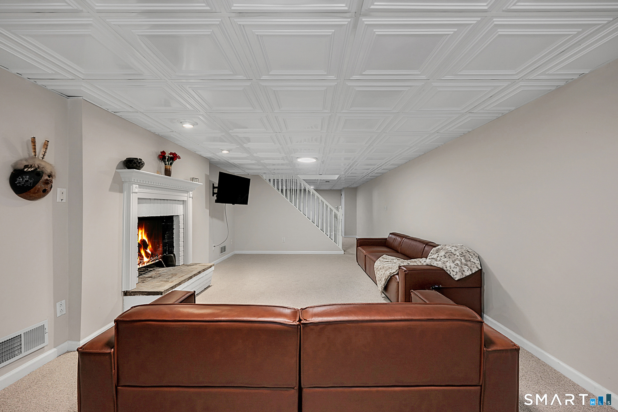 273 Osborne Hill Road Fairfield, CT 06824 - Photo 29 of 40 The Family Room also boasts a stunning fireplace.