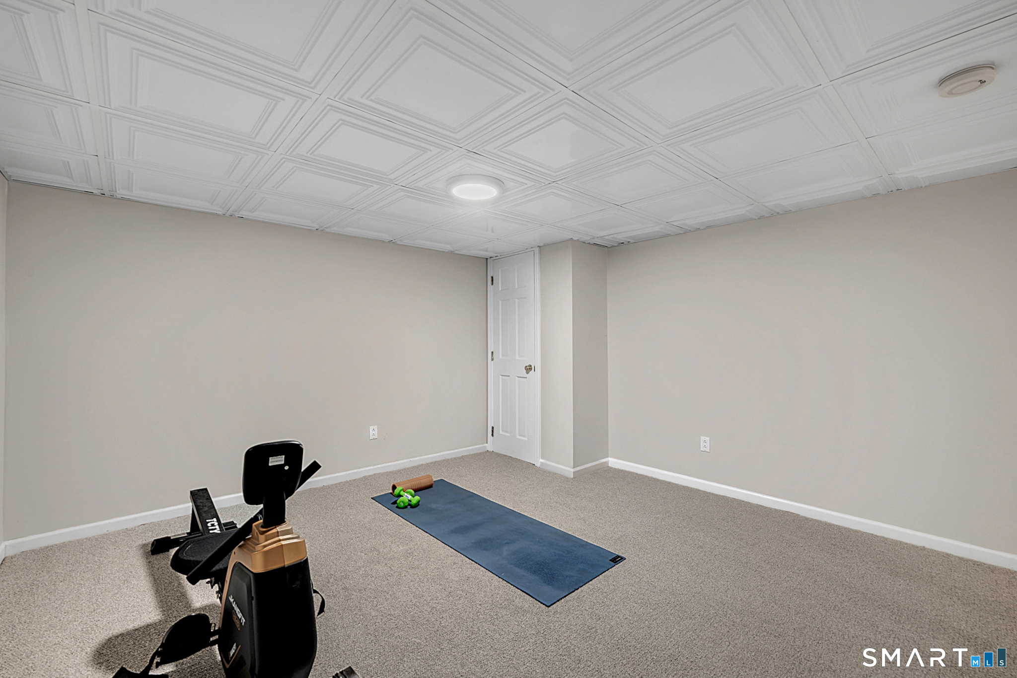 273 Osborne Hill Road Fairfield, CT 06824 - Photo 30 of 40 The other part of the Lower Level could be used as a gym, play area, or office.