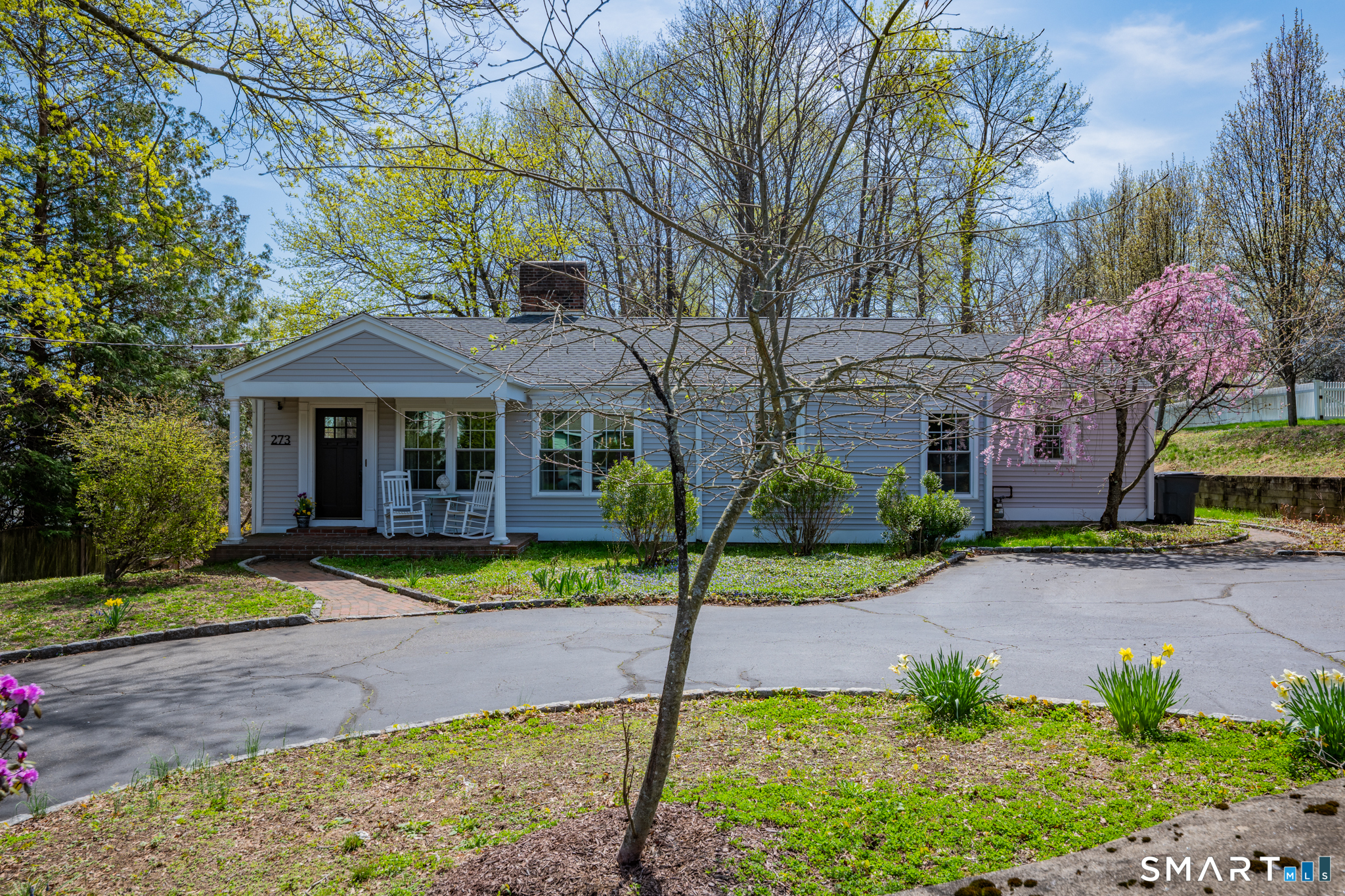 273 Osborne Hill Road Fairfield, CT 06824 - Photo 3 of 40 The circular driveway provides ample space for parking.
