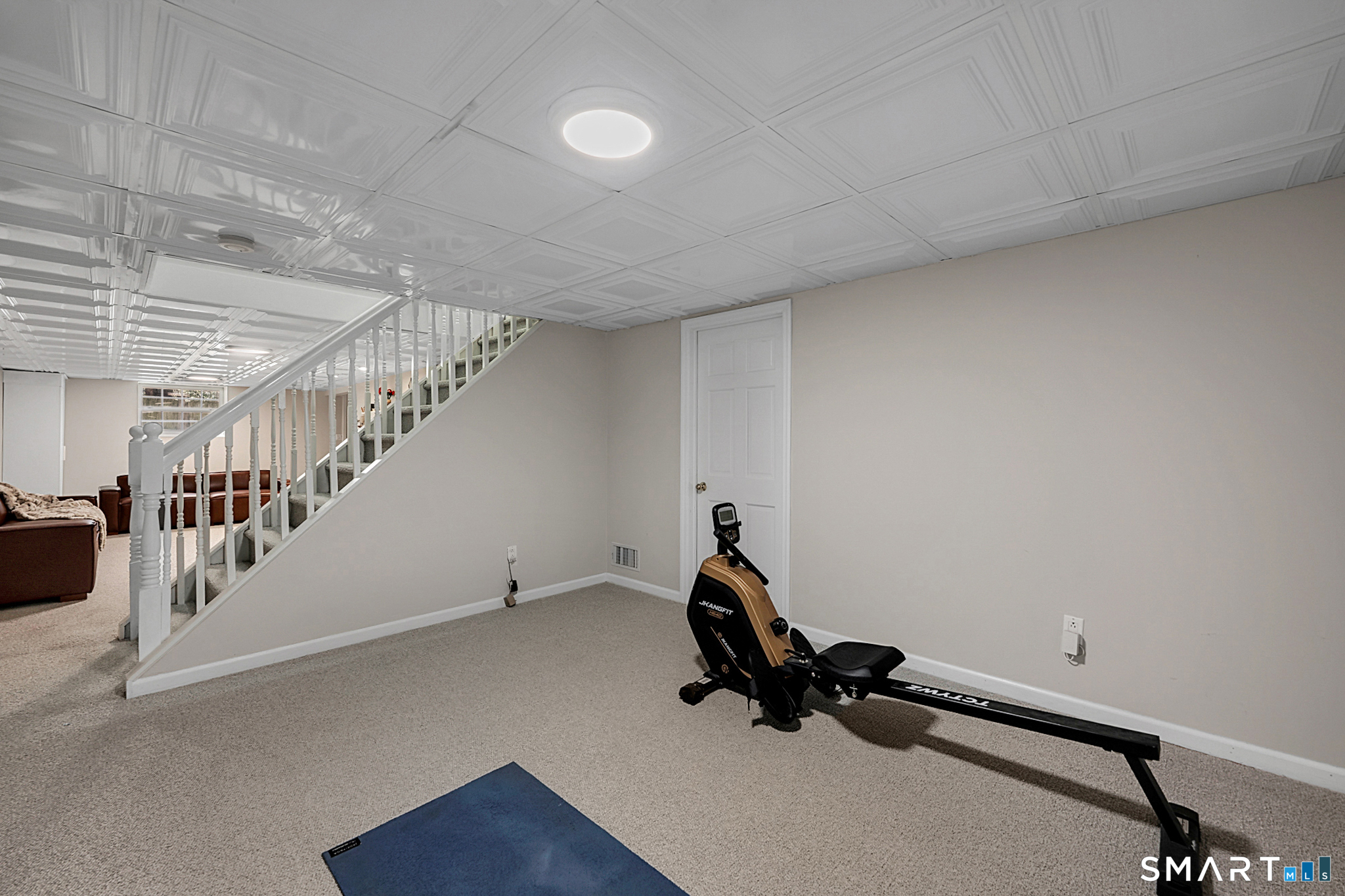 273 Osborne Hill Road Fairfield, CT 06824 - Photo 31 of 40 There is a ton of storage space in the unfinished part of the basement.