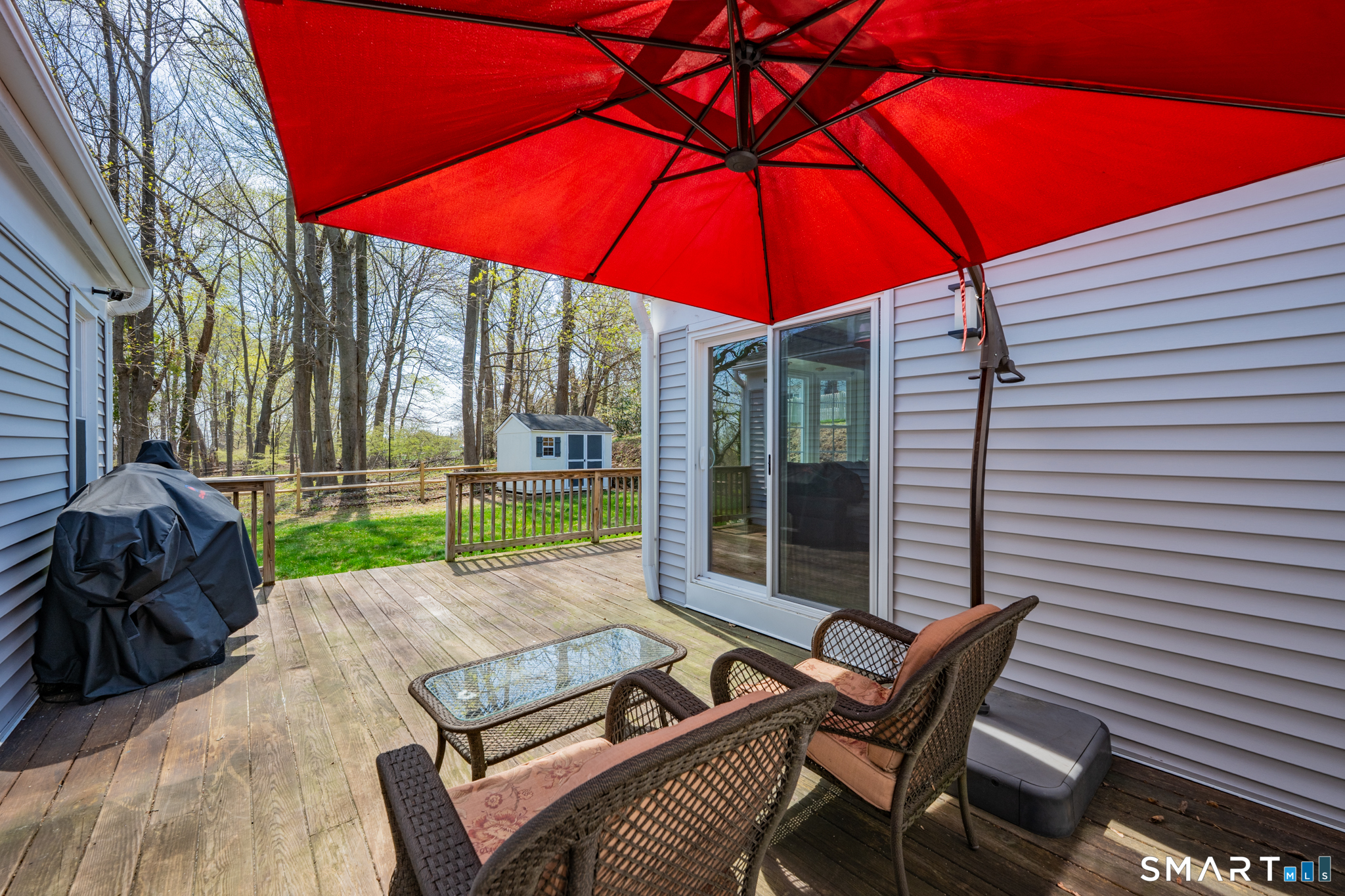 273 Osborne Hill Road Fairfield, CT 06824 - Photo 33 of 40 Sliders flow into the Dining Room and the other set flows into the Office/Bedroom.