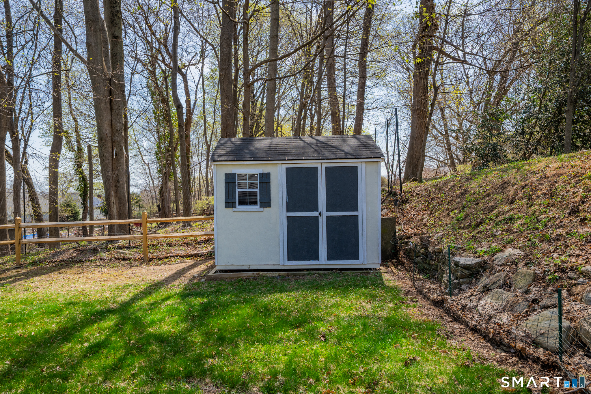 273 Osborne Hill Road Fairfield, CT 06824 - Photo 36 of 40 The property has a shed for outdoor storage.