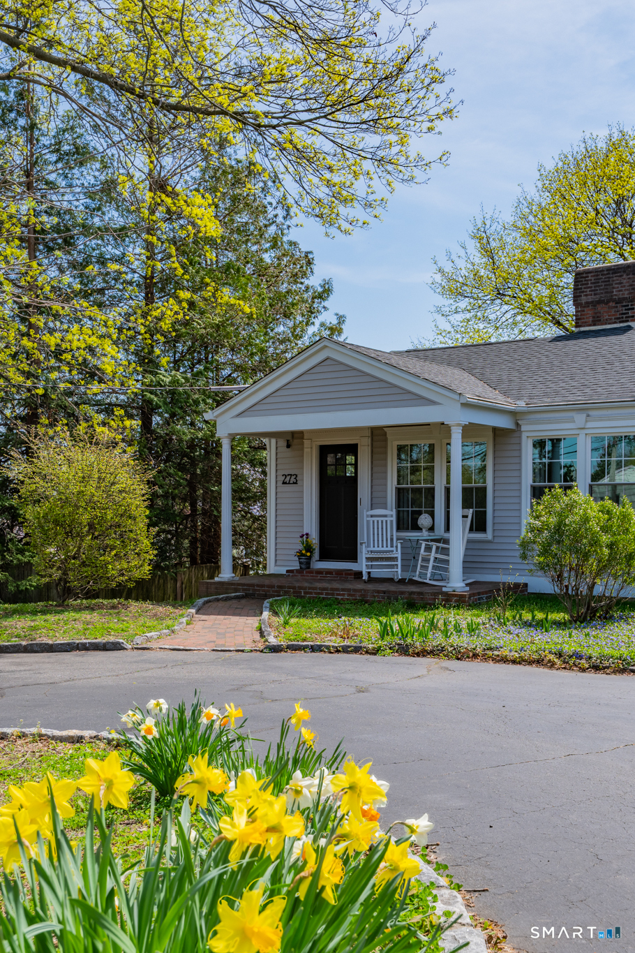 273 Osborne Hill Road Fairfield, CT 06824 - Photo 38 of 40 The home has beautiful flowers and shrubs that bloom in the Spring.