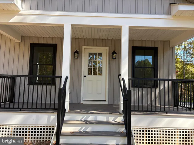 a view of a balcony with a potted plant
