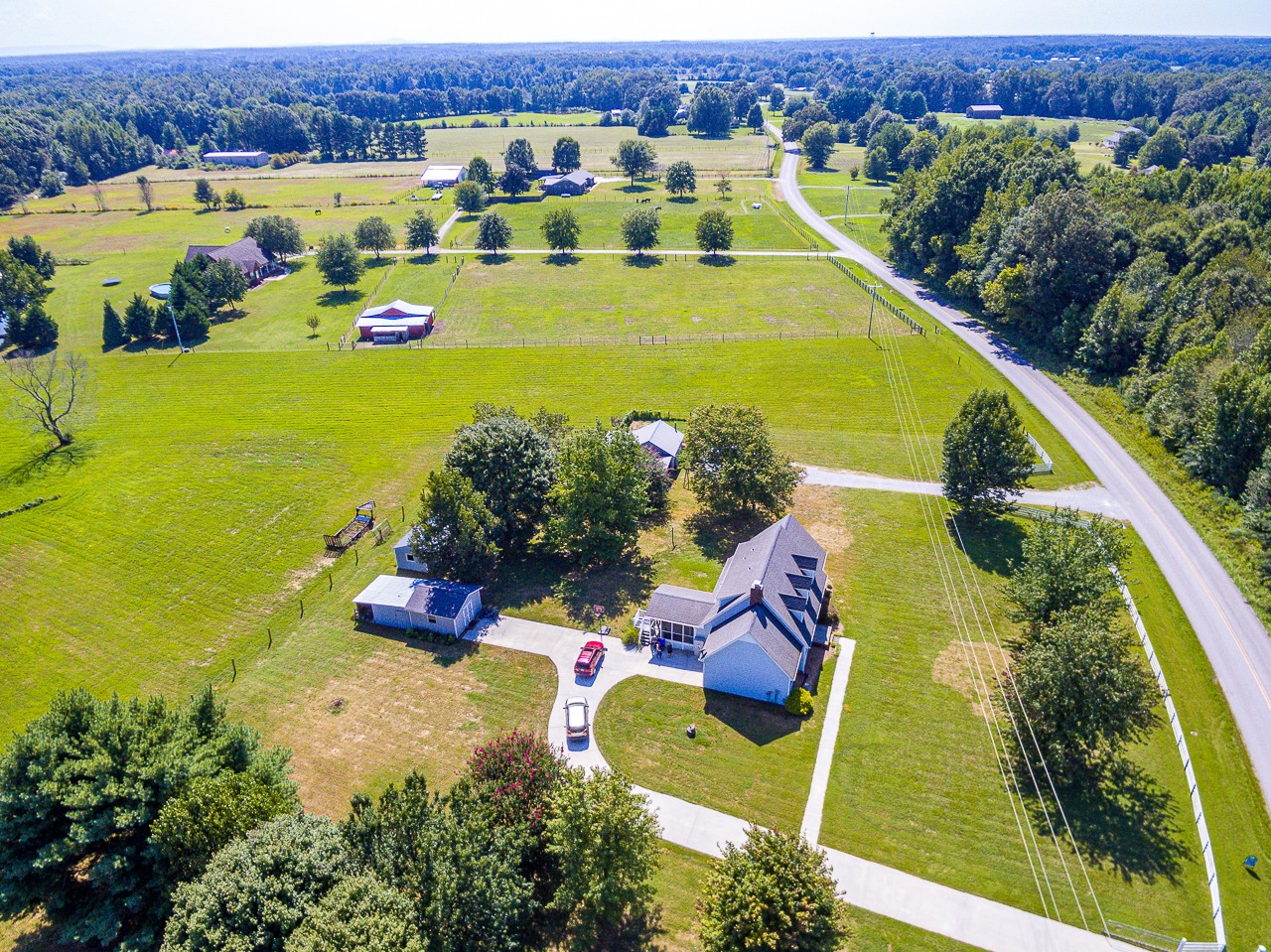 80 Pendergrass Road Flintville, TN 37335 - Photo 8 of 48 an aerial view of a house with a swimming pool