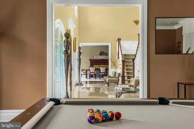 a bathroom with a mirror and a sink