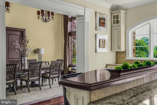 a view of a dining room with furniture window and outside view