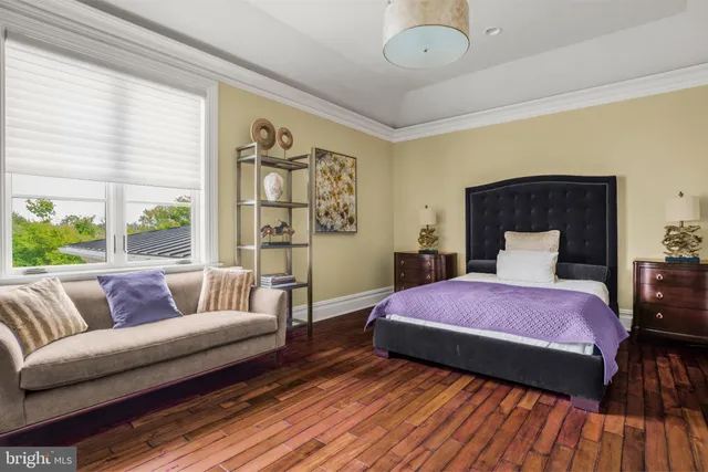 a view of an empty room with wooden wall