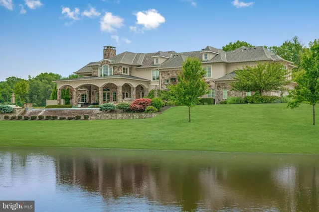 a front view of a building with garden
