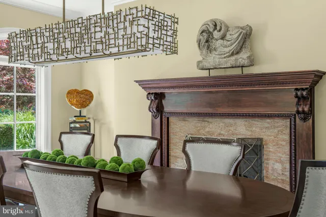 a view of dining room with furniture and wooden floor