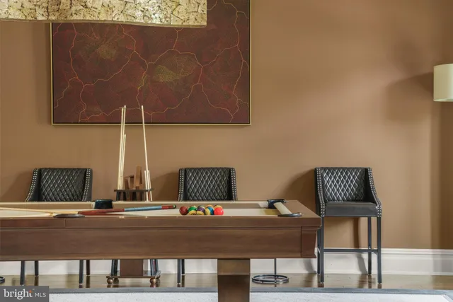a view of kitchen cabinets and window
