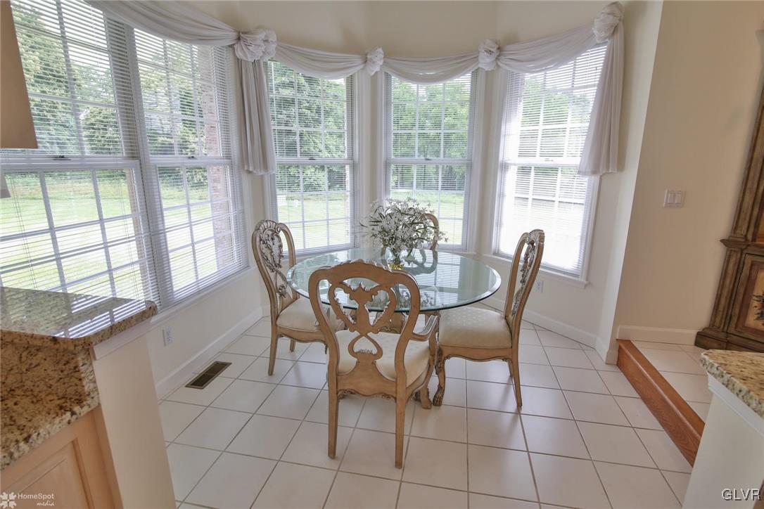 618 Bok Road Nazareth, PA 18064 - Photo 13 of 50 a dining room with furniture and large windows