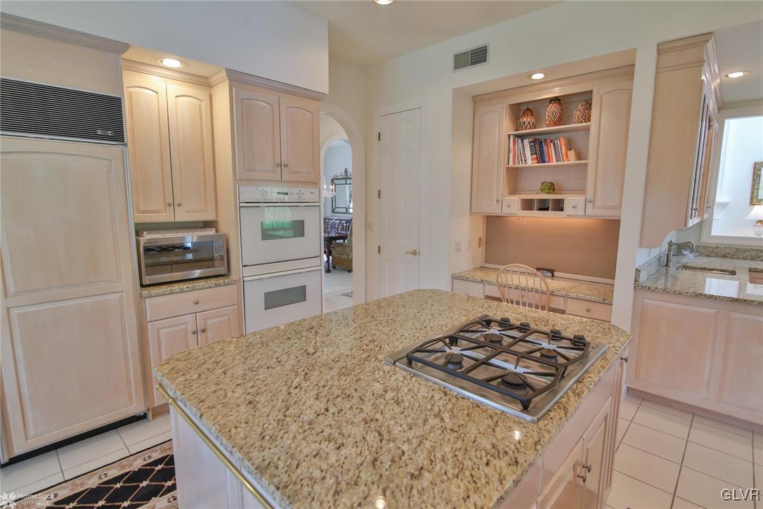 618 Bok Road Nazareth, PA 18064 - Photo 14 of 50 a kitchen with kitchen island white cabinets and appliances