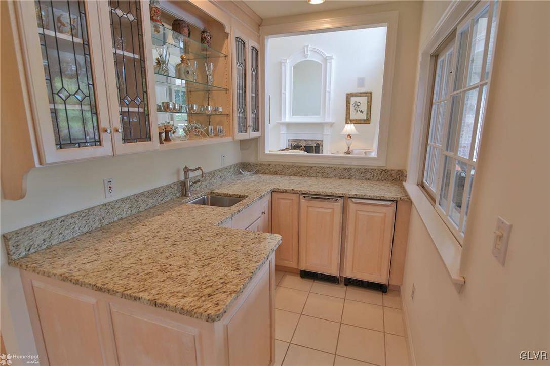 618 Bok Road Nazareth, PA 18064 - Photo 16 of 50 a bathroom with a granite countertop sink and a mirror