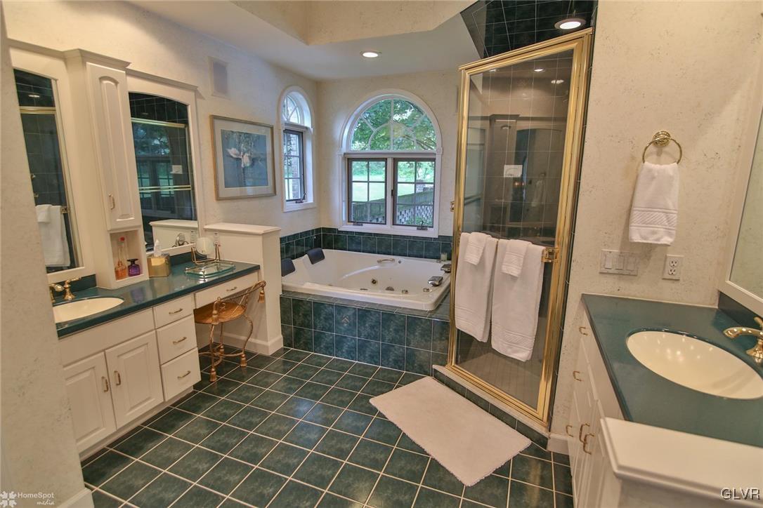 618 Bok Road Nazareth, PA 18064 - Photo 20 of 50 a bathroom with a sink mirror vanity and a bathtub