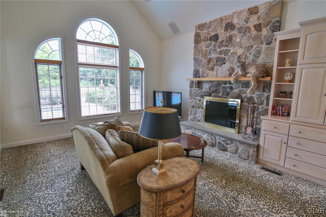 618 Bok Road Nazareth, PA 18064 - Photo 25 of 50 a living room with furniture a fireplace and windows