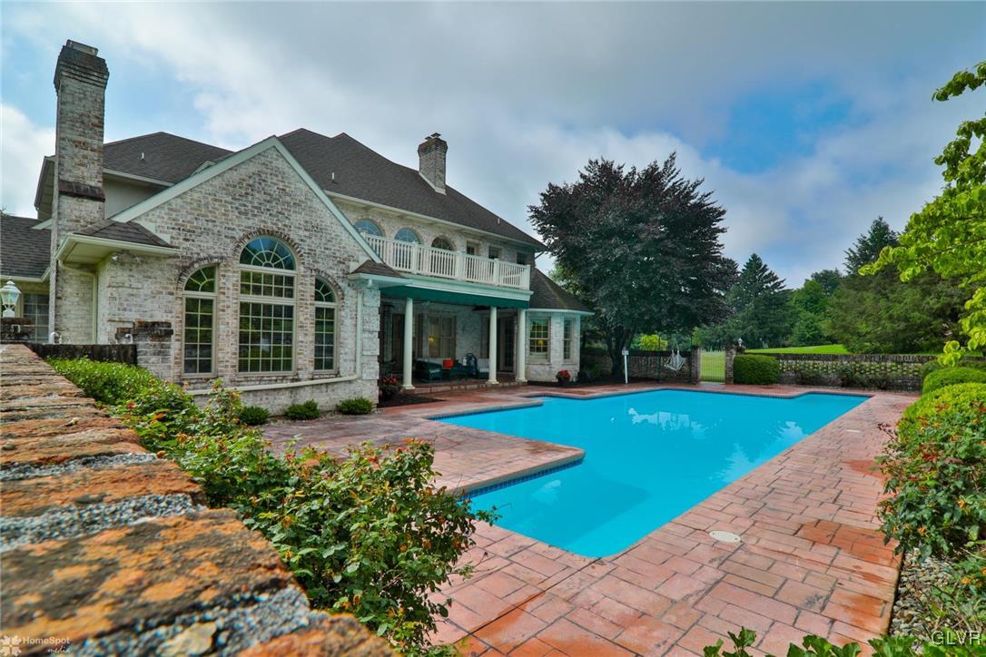 618 Bok Road Nazareth, PA 18064 - Photo 36 of 50 a view of a house with swimming pool and a yard
