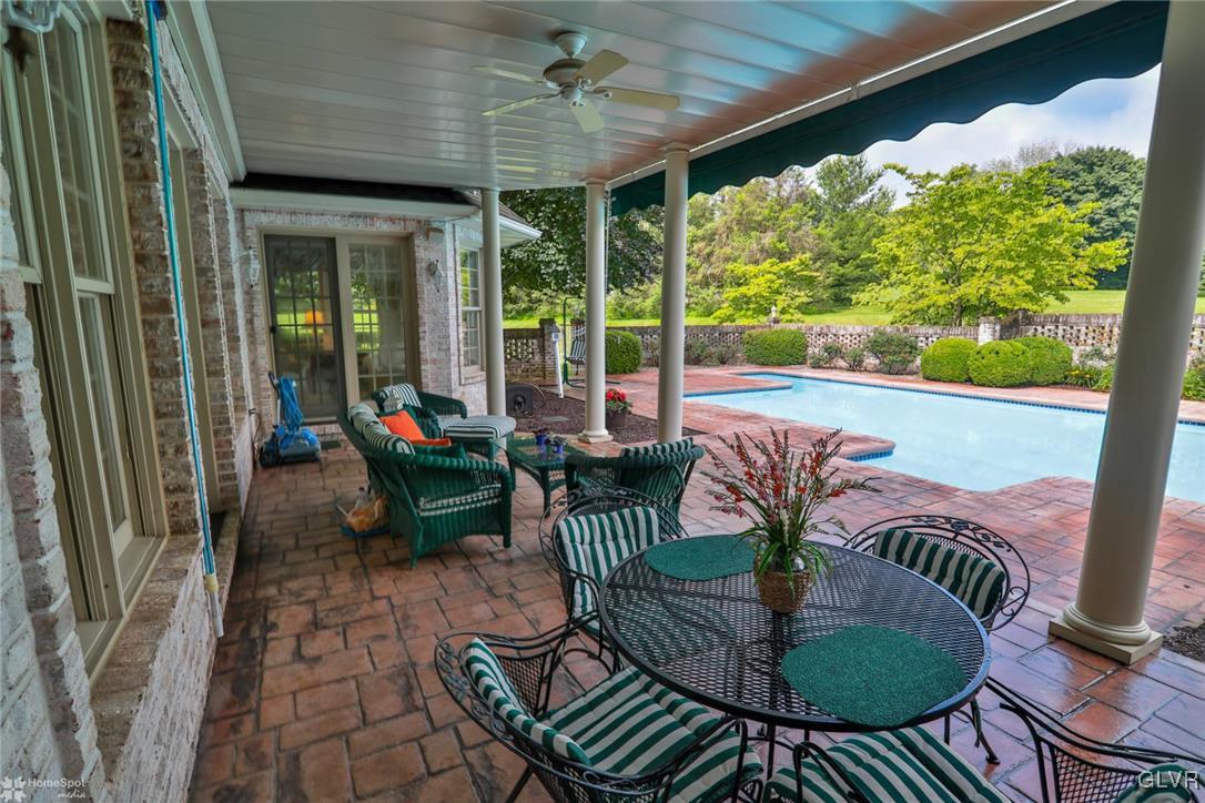 618 Bok Road Nazareth, PA 18064 - Photo 43 of 50 a view of a porch with furniture and a yard