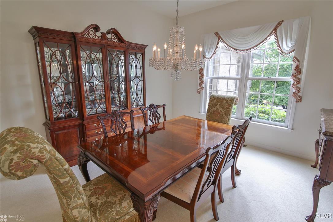 618 Bok Road Nazareth, PA 18064 - Photo 6 of 50 a dining room with furniture a chandelier and wooden floor