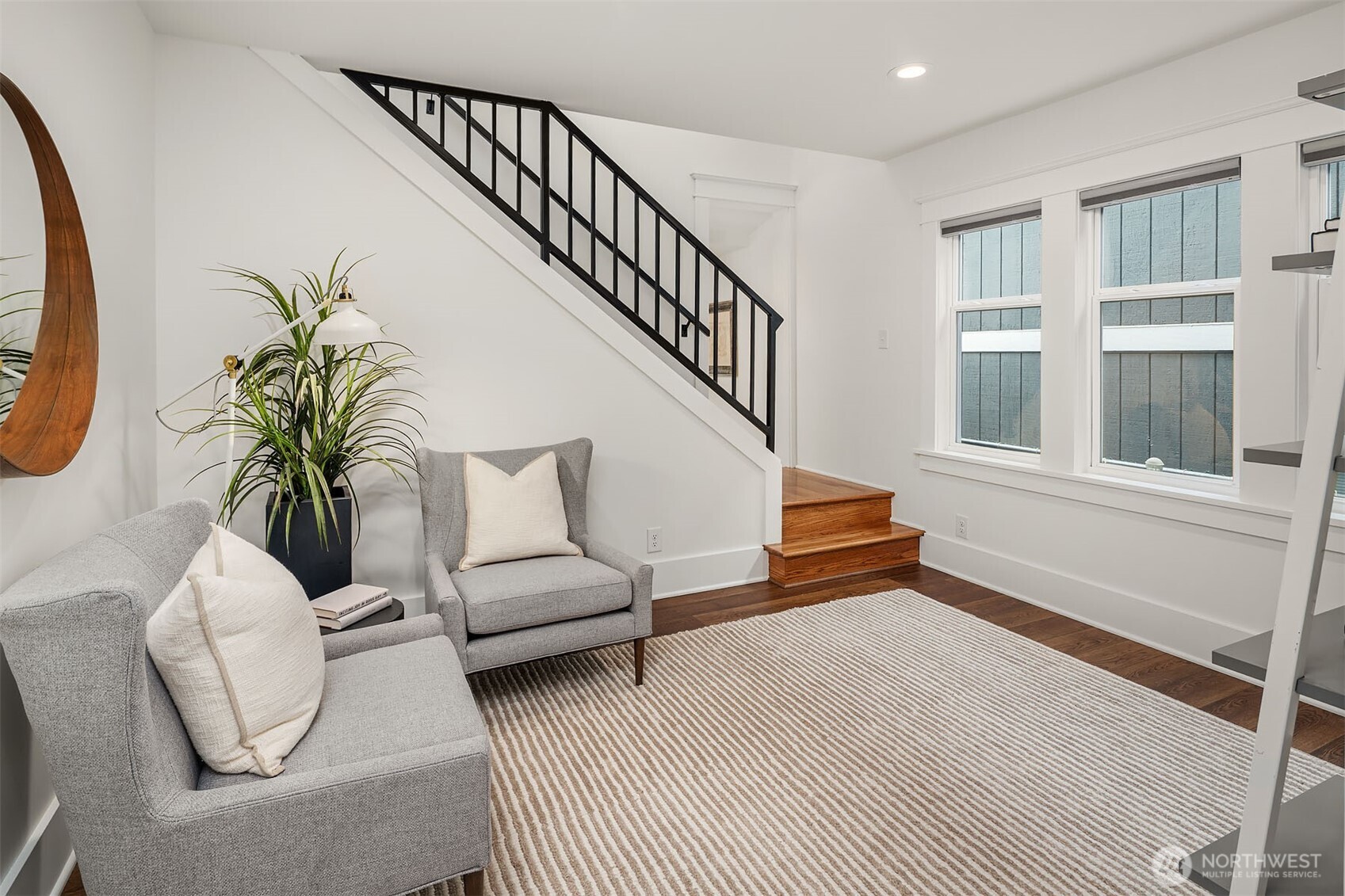 519 27th Avenue Seattle, WA 98122 - Photo 11 of 38 a living room with furniture and a potted plant