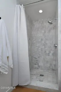 a workspace with furniture and a window