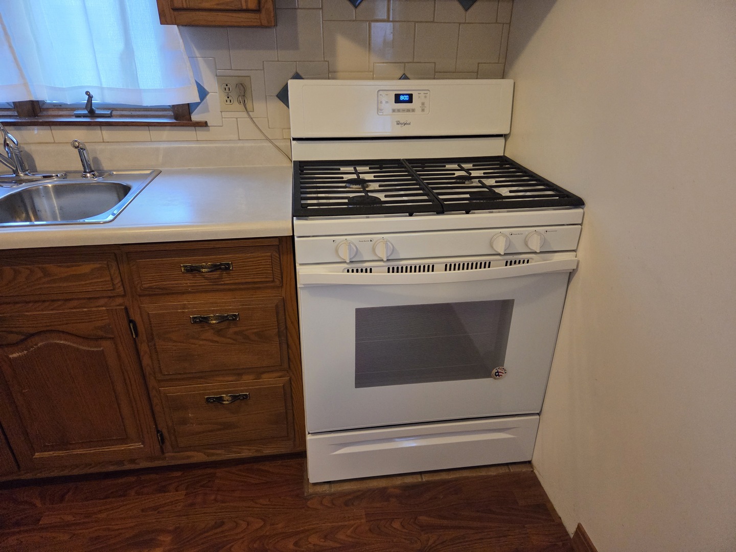712 East Monroe Street Bloomington, IL 61701 - Photo 7 of 34 a stove top oven sitting inside of a kitchen