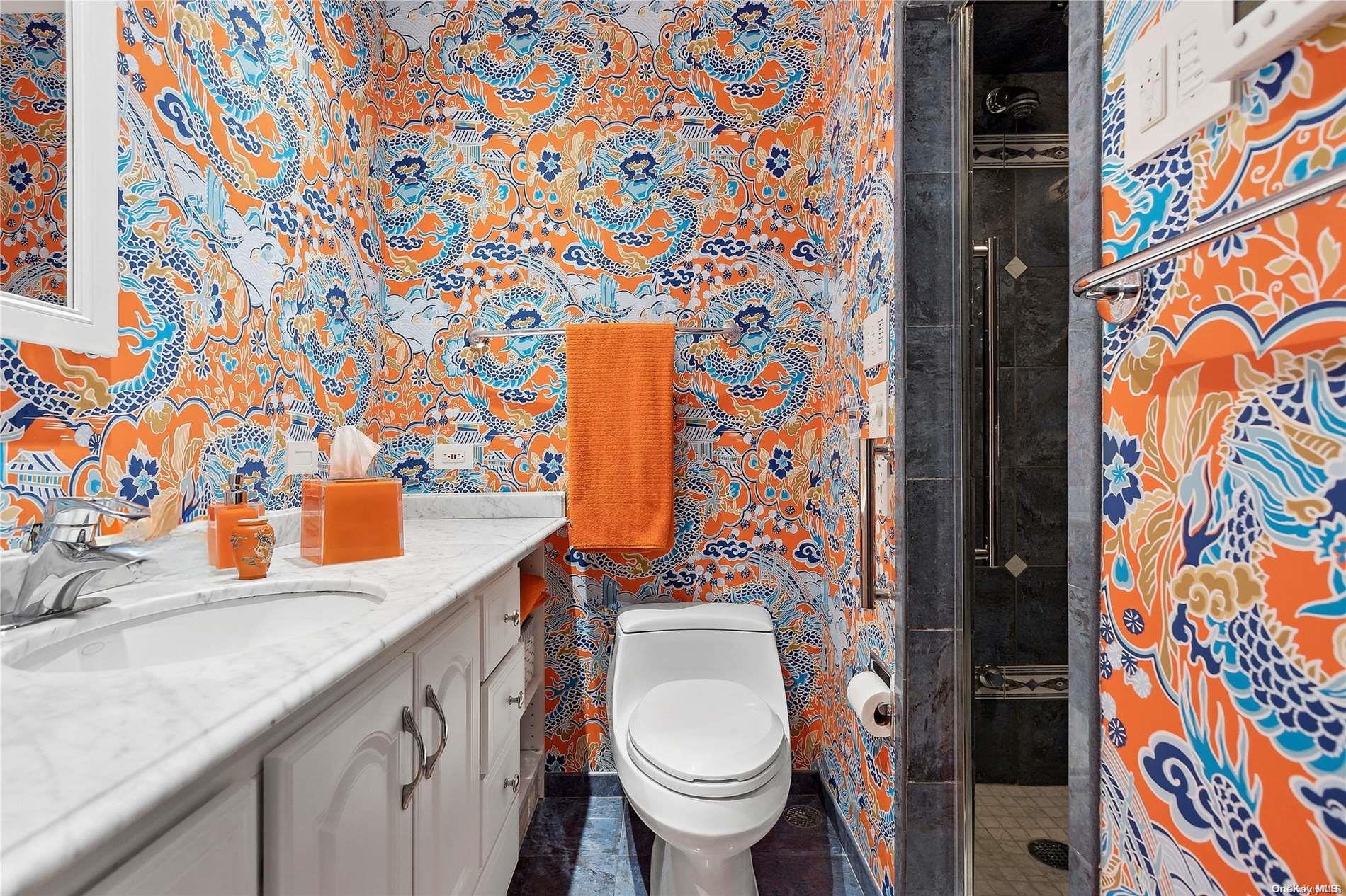 293 Great River Road Great River, NY 11739 - Photo 22 of 30 a bathroom with a granite countertop sink and a toilet
