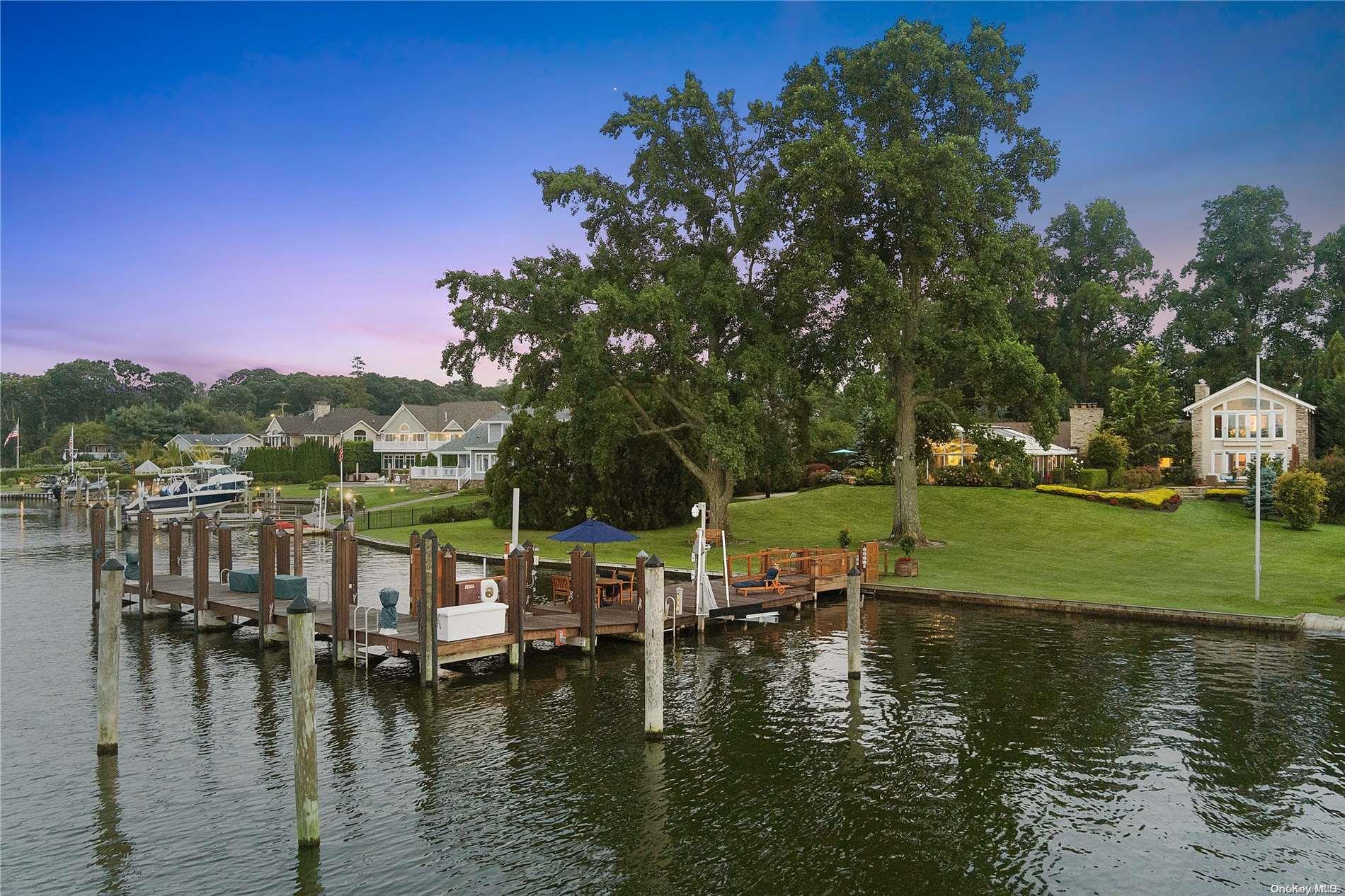 293 Great River Road Great River, NY 11739 - Photo 26 of 30 a view of house with swimming pool and outdoor space