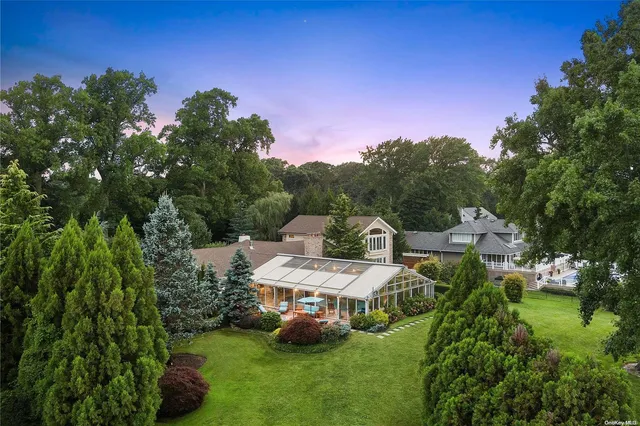 a view of a house with a yard garden and street view