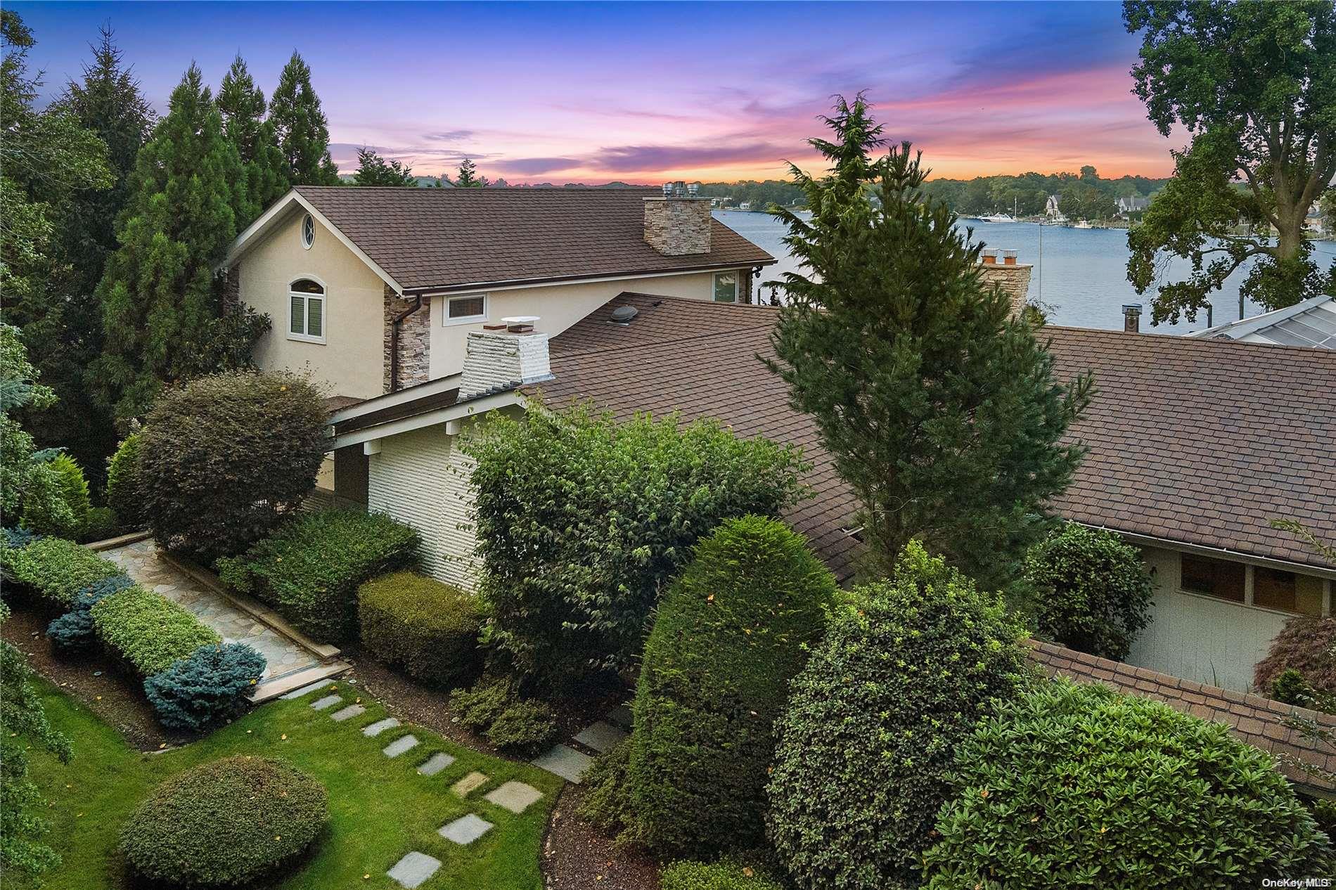 293 Great River Road Great River, NY 11739 - Photo 4 of 30 a view of a house with a yard