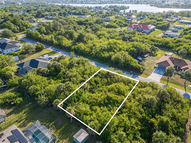 a view of a balcony with floor to ceiling windows