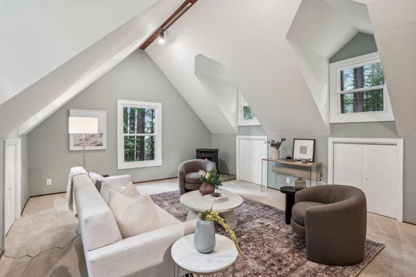 13872 Silver Sky Way Woodside, CA 94062 - Photo 58 of 78 a living room with furniture fireplace and a window