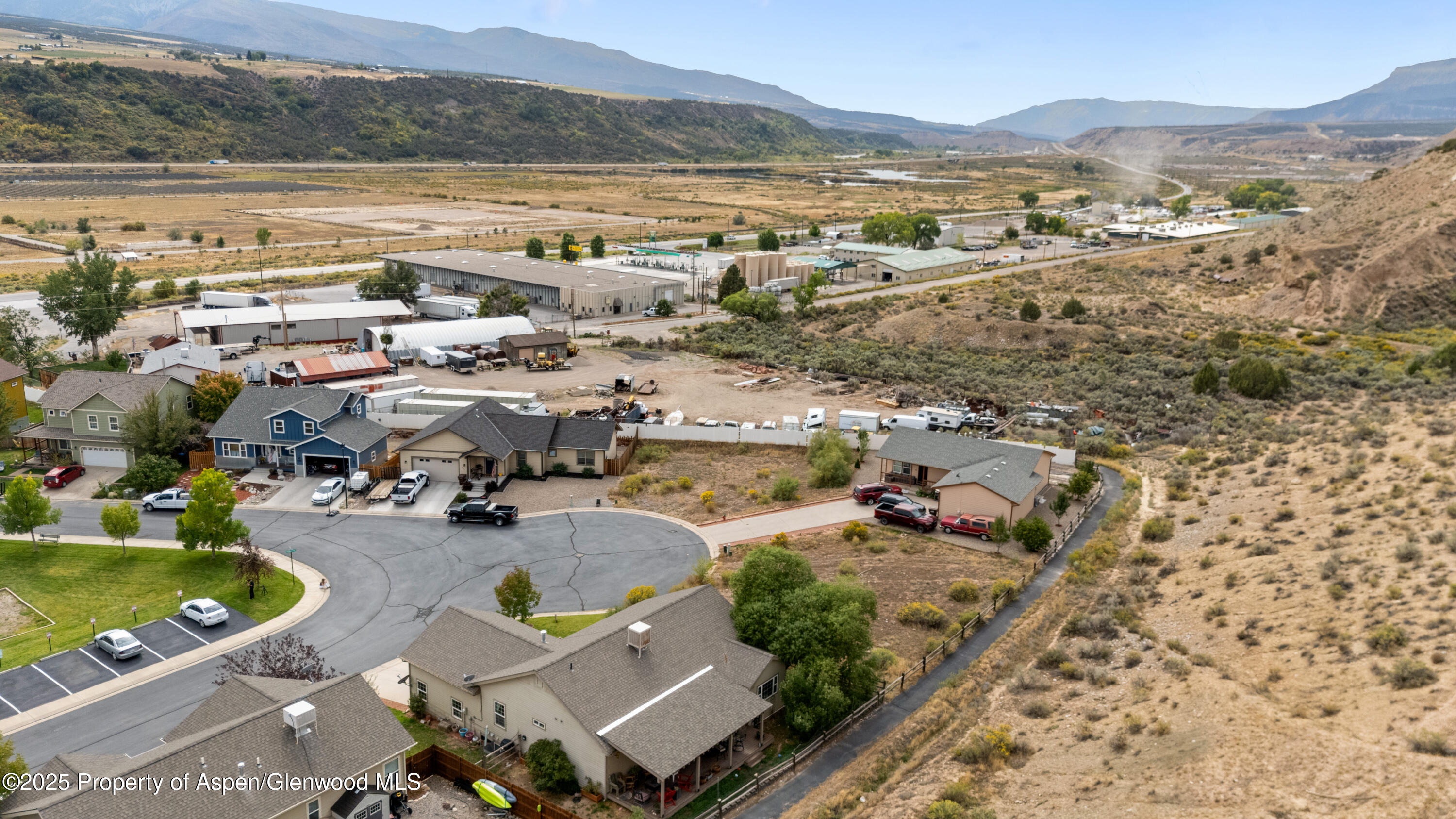 2495 Pioneer Way Rifle, CO 81650 - Photo 6 of 8 a view of a city with a lake