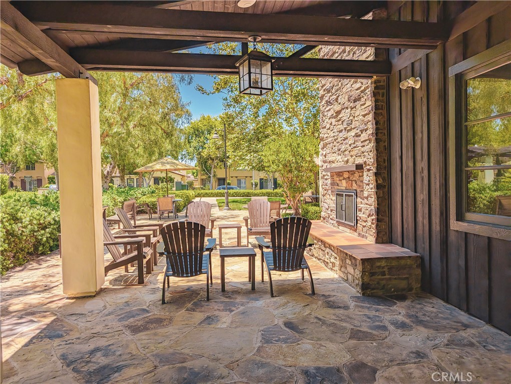 42 Blossom Irvine, CA 92620 - Photo 34 of 34 a living room with a large window and a table