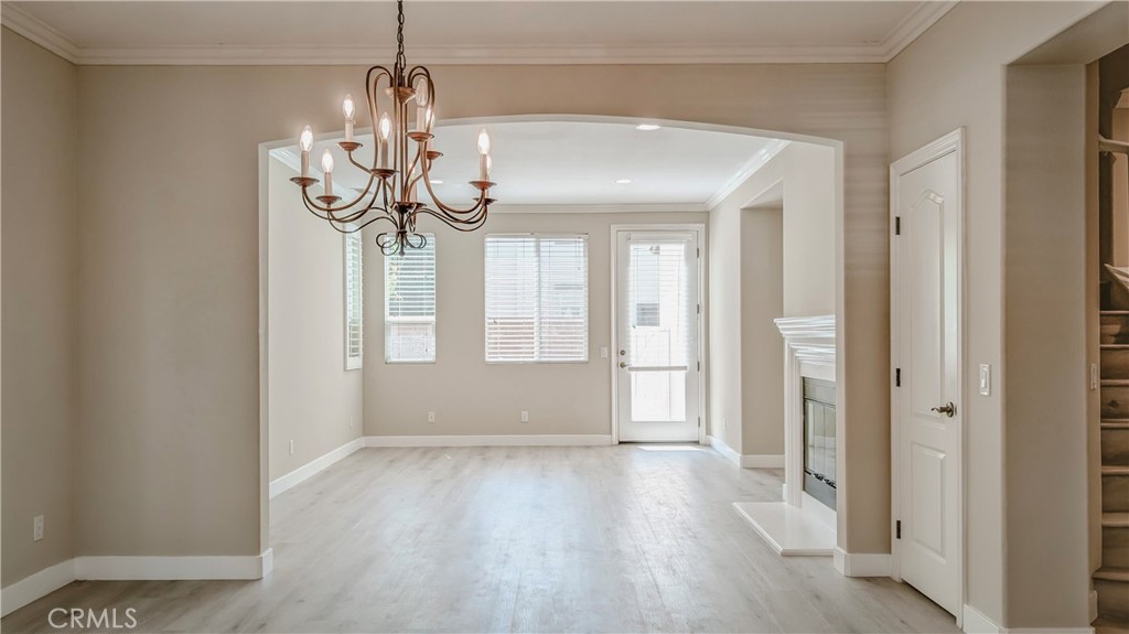 42 Blossom Irvine, CA 92620 - Photo 9 of 34 a view of a room with wooden floor and ceiling fan
