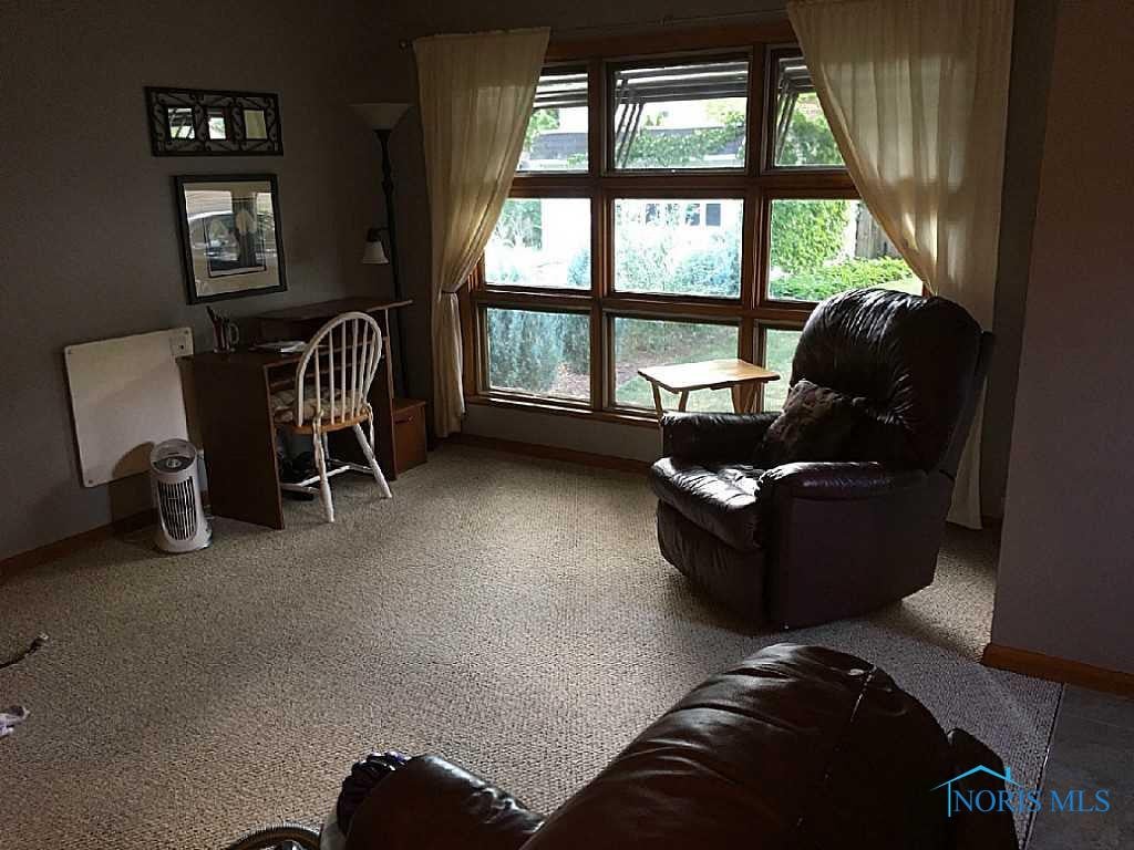Family Room. Spacious FR/Den with huge window with backyard view.