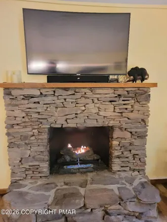a stove top oven sitting inside of a kitchen