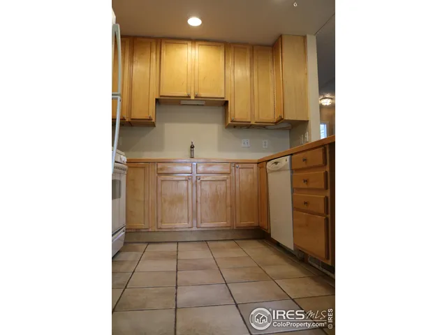 a view of a kitchen with a sink