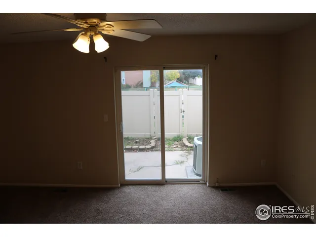 a view of an empty room and window