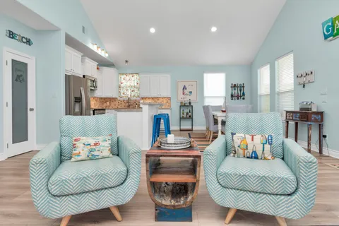 a living room with furniture and a couch