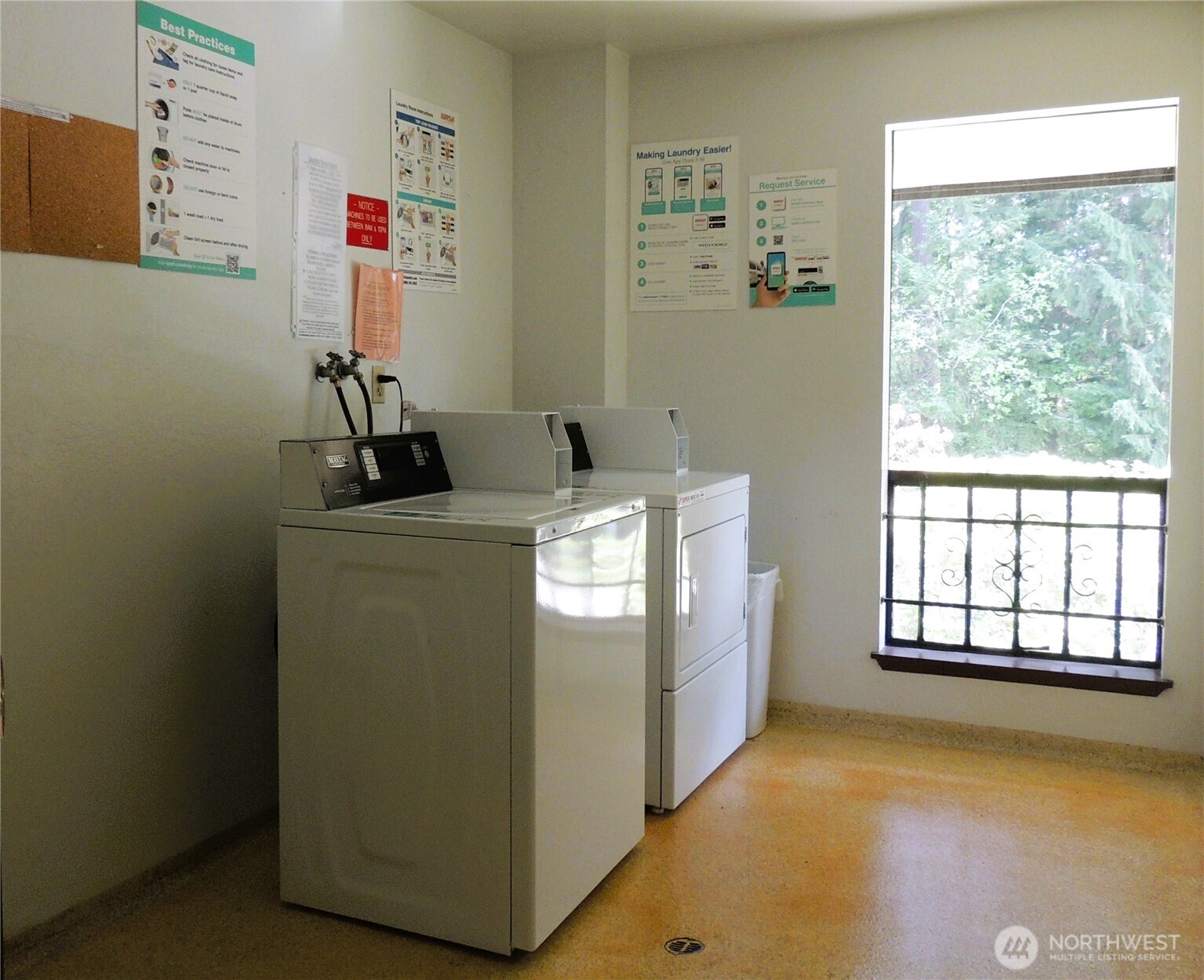 19409 56th Avenue West, Unit 306 Lynnwood, WA 98036 - Photo 16 of 21 a utility room with dryer and washer