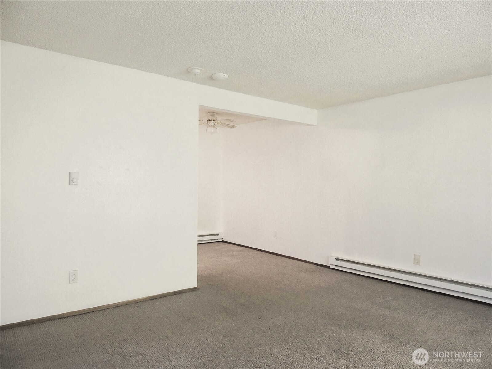 19409 56th Avenue West, Unit 306 Lynnwood, WA 98036 - Photo 4 of 21 an empty room with a empty space