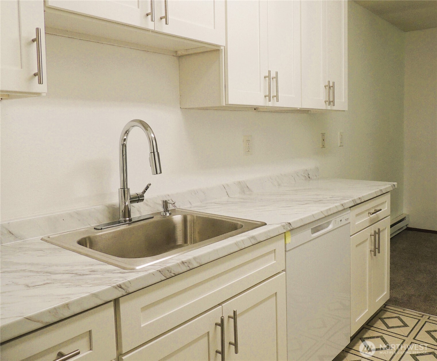 19409 56th Avenue West, Unit 306 Lynnwood, WA 98036 - Photo 8 of 21 a close view of sink and tap