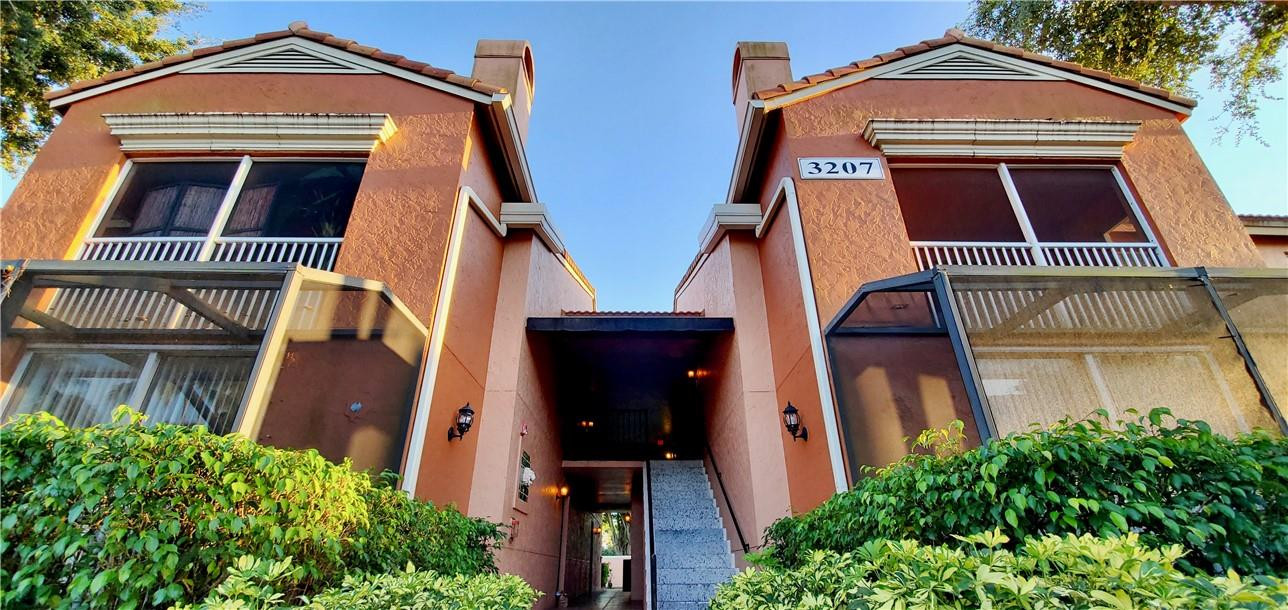 3207 Clint Moore Road, Unit 104 Boca Raton, FL 33496 - Photo 29 of 46 a front view of a building