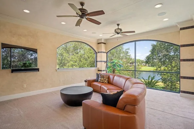 a view of a living room filled with furniture