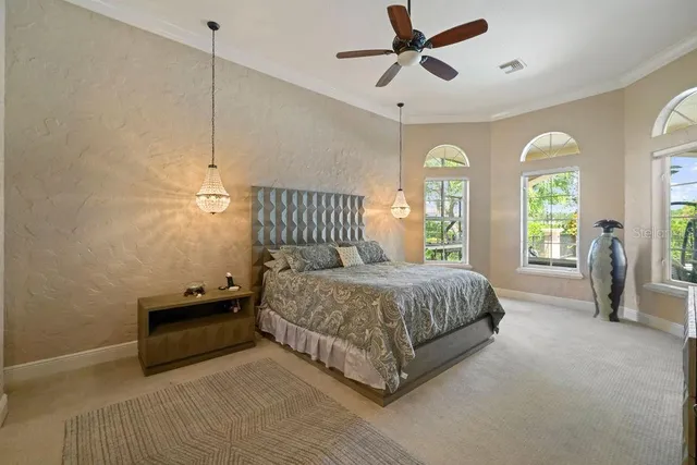 a spacious bathroom with a tub shower and mirror