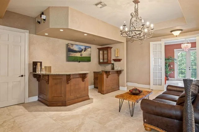 a bedroom with a bed dresser and a window