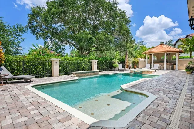 a view of a house with swimming pool
