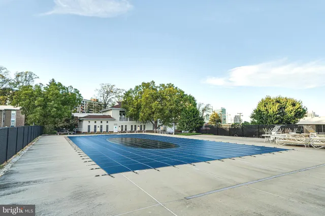 a view of an outdoor space and tennis court
