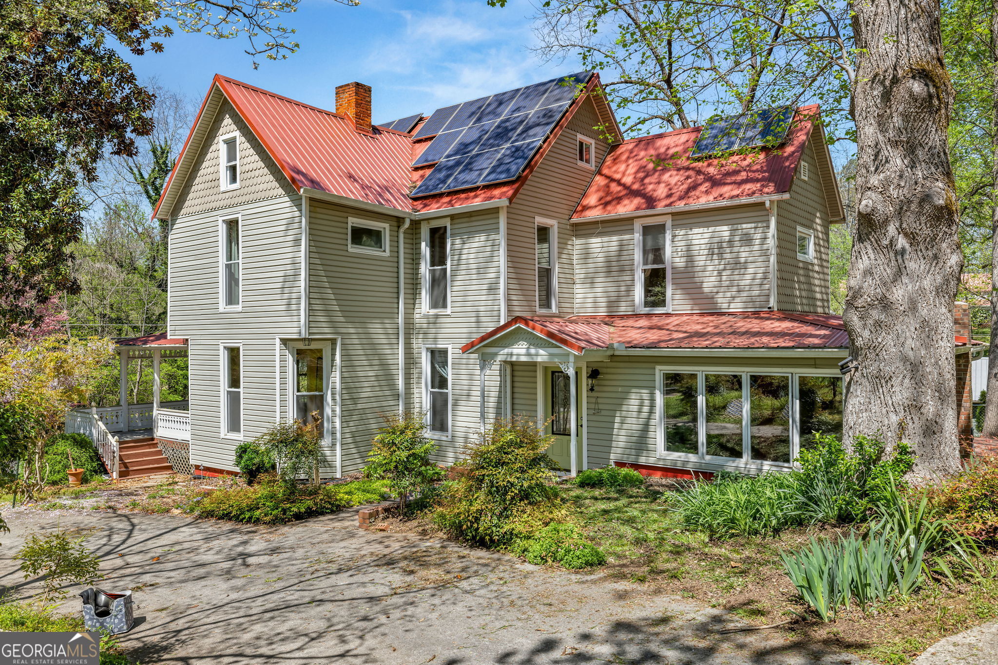 623 Maine Street Demorest, GA 30535 - Photo 1 of 1 a front view of a house with garden